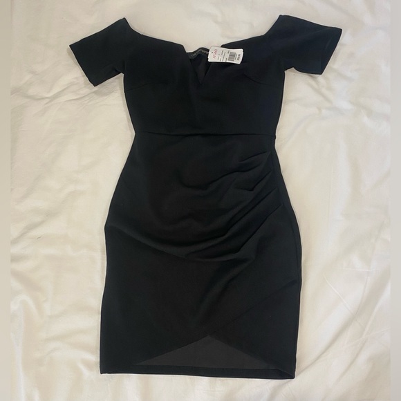 a'gaci Dresses & Skirts - Black‎ Agaci Dress